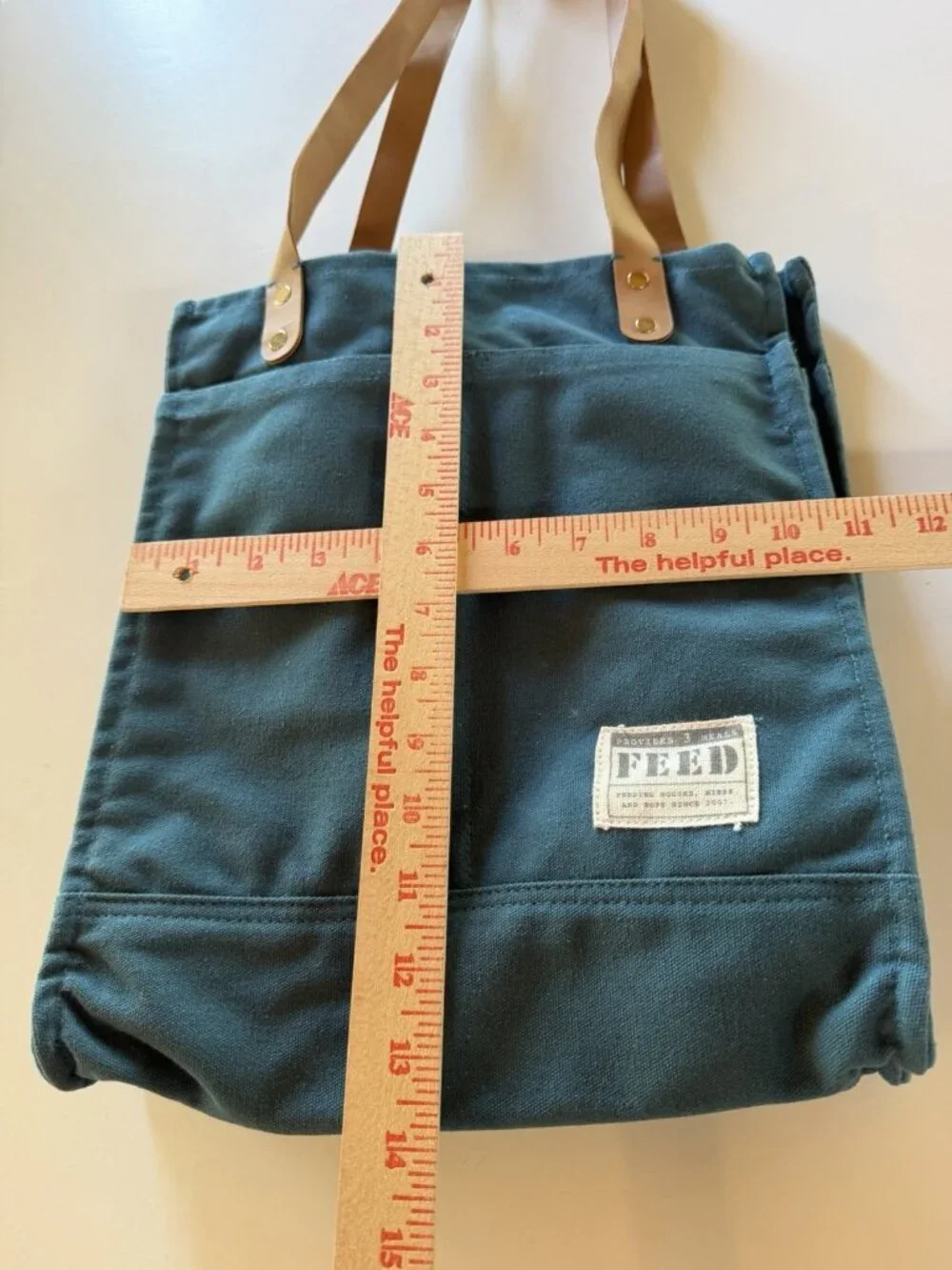 FEED Projects teal double-handle canvas pockets travel academia indie totebag